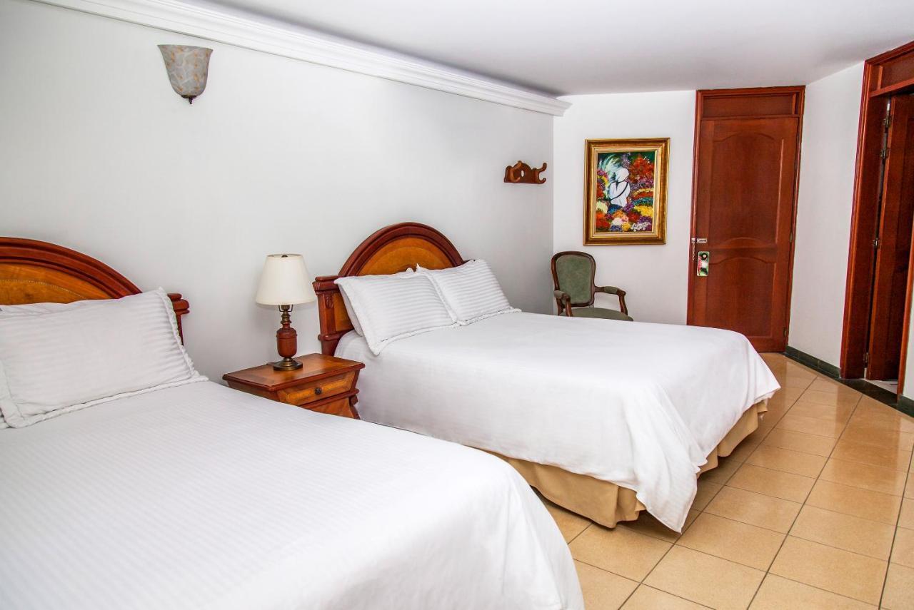 Hotel Casa Laureles Медельин Экстерьер фото