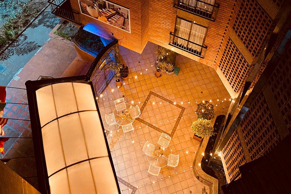 Hotel Casa Laureles Медельин Экстерьер фото